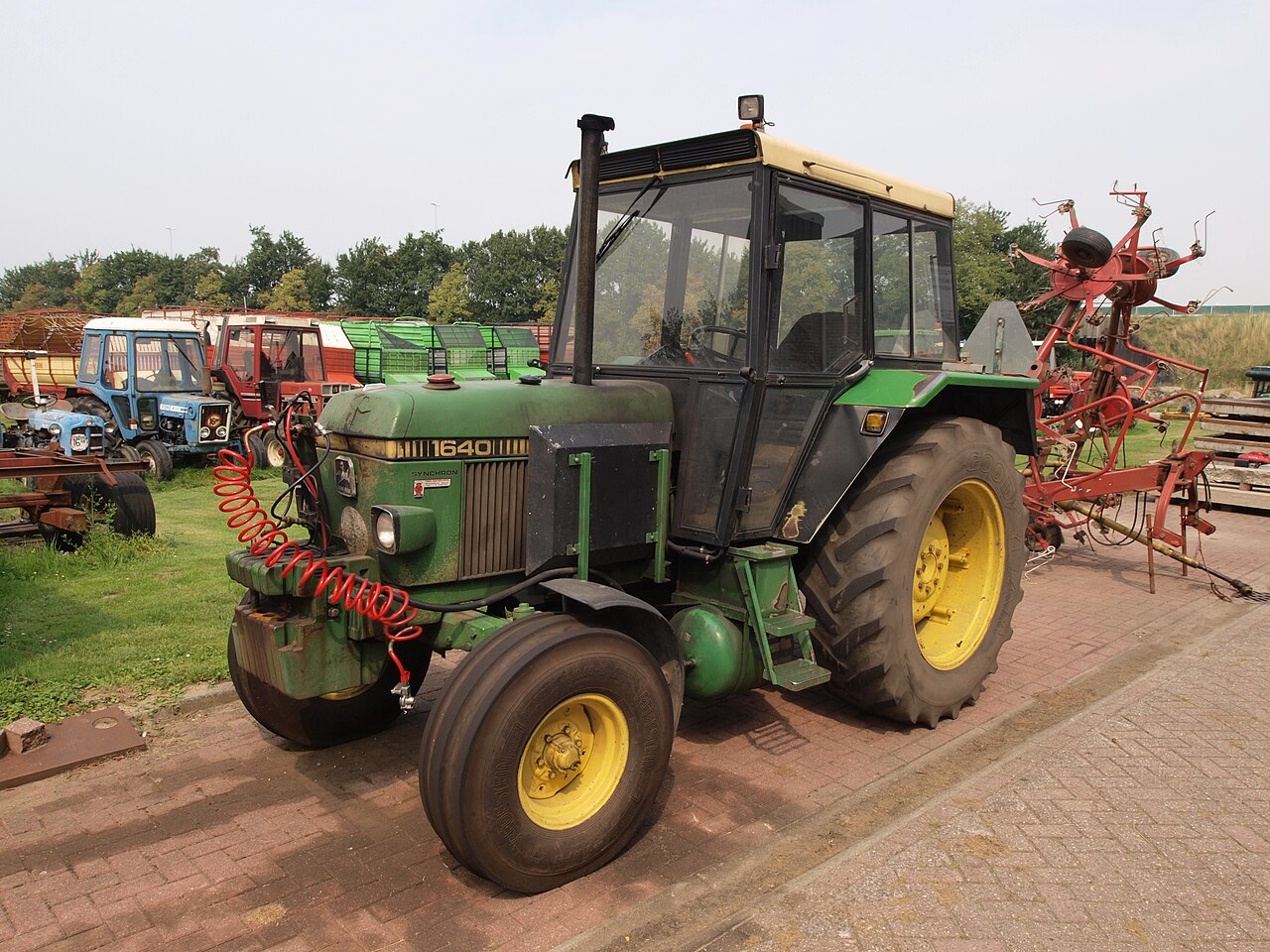 John Deere 1640 med synlig modellbeteckning.